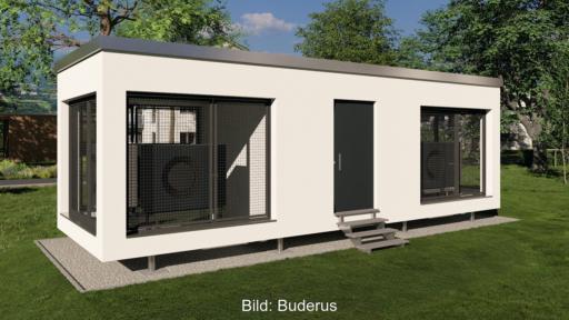 Die Energie-System-Box von Buderus, der Container enthält die komplette Wärmepumpen-Heiztechnik für ein Mehrfamilienhaus.